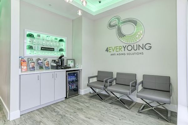 Clean, professional medical spa treatment room with neutral tones at 4Ever Young Med Spa & Wellness Center - Mesa in Mesa