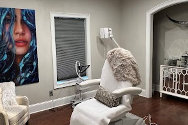 Clean, professional medical spa treatment room with neutral tones at Alma Rose in Greenville