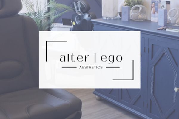 Clean, professional medical spa treatment room with neutral tones at Alter Ego Aesthetics in Fargo