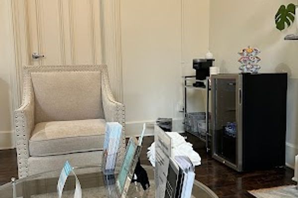 Clean, professional medical spa treatment room with neutral tones at Bare Beauty Medspa & Skincare in Milwaukee