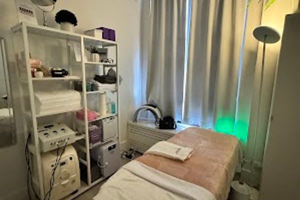 Clean, professional medical spa treatment room with neutral tones at Berry Blonde Spa in New York