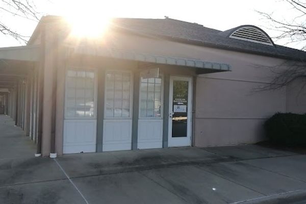 Clean, professional medical spa treatment room with neutral tones at Chenal Valley Medical Aesthetics in Little Rock