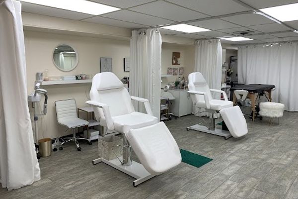 Clean, professional medical spa treatment room with neutral tones at Dear Body Skincare & Body Contouring in Baltimore