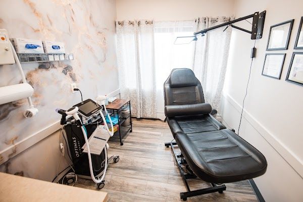 Clean, professional medical spa treatment room with neutral tones at Dream Medspa in Denver