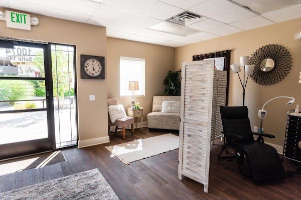 Clean, professional medical spa treatment room with neutral tones at Evoke Esthetics Medspa in Boise