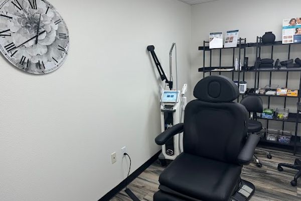 Clean, professional medical spa treatment room with neutral tones at Flawless Laser & Medspa in Cheyenne