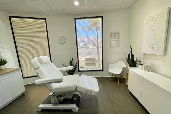 Clean, professional medical spa treatment room with neutral tones at Jouvance Med Spa in Tucson