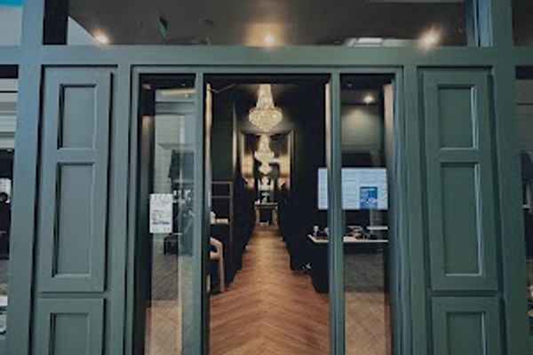 Clean, professional medical spa treatment room with neutral tones at LASÉRIE in Edina