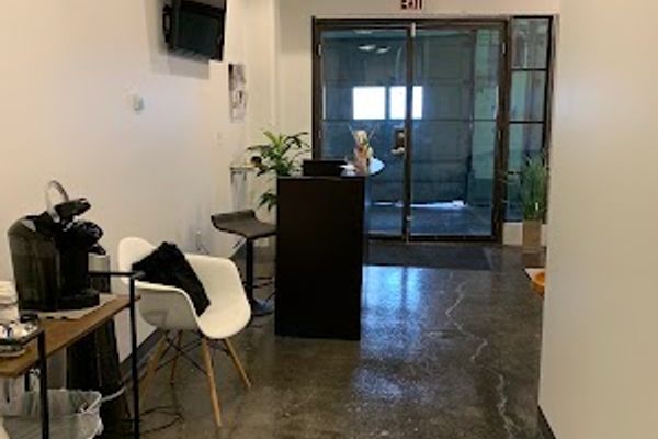 Clean, professional medical spa treatment room with neutral tones at Mod Spa Mke in Milwaukee