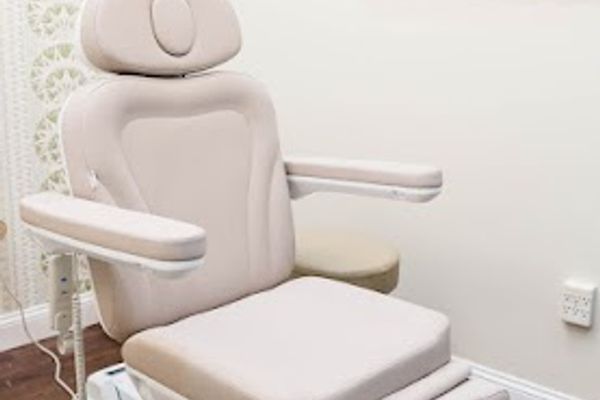 Clean, professional medical spa treatment room with neutral tones at Muse Medical Spa in Richmond