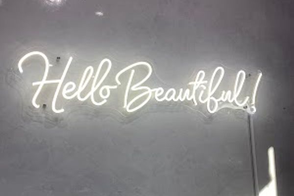 Clean, professional medical spa treatment room with neutral tones at NkdSkin Aesthetics Lounge in Henderson