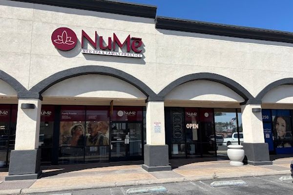 Clean, professional medical spa treatment room with neutral tones at NuMe Health Services in Henderson