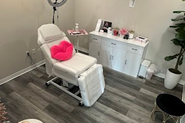 Clean, professional medical spa treatment room with neutral tones at Pretty Please By KT Aesthetics & Wellness in Manchester