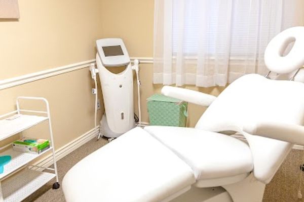 Clean, professional medical spa treatment room with neutral tones at Refine Medical Spa in Provo