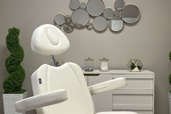 Clean, professional medical spa treatment room with neutral tones at Revive Aesthetics in Jacksonville