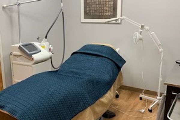 Clean, professional medical spa treatment room with neutral tones at Sara Dunlap, RN in Anchorage