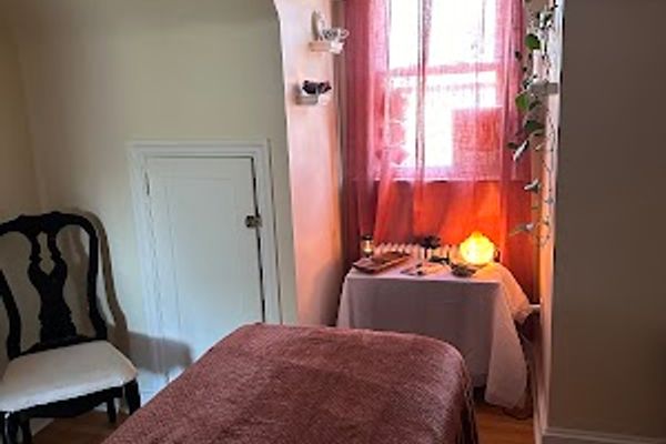 Clean, professional medical spa treatment room with neutral tones at Secret Garden in Wilmington