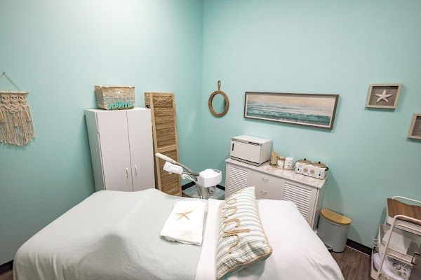 Clean, professional medical spa treatment room with neutral tones at Skin Sanctuary in Sioux Falls