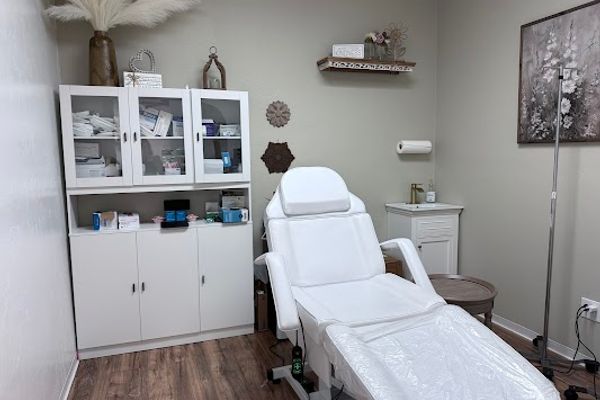 Clean, professional medical spa treatment room with neutral tones at Sonoran Wellness and Vitality in Tucson