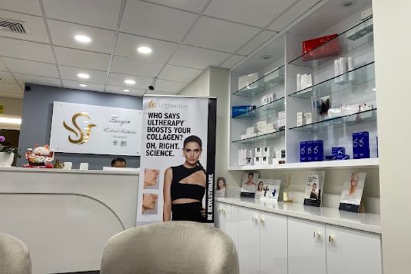 Clean, professional medical spa treatment room with neutral tones at Sooyin Medical Aesthetics in Brookline