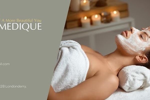 Clean, professional medical spa treatment room with neutral tones at Spa Medique in Manchester