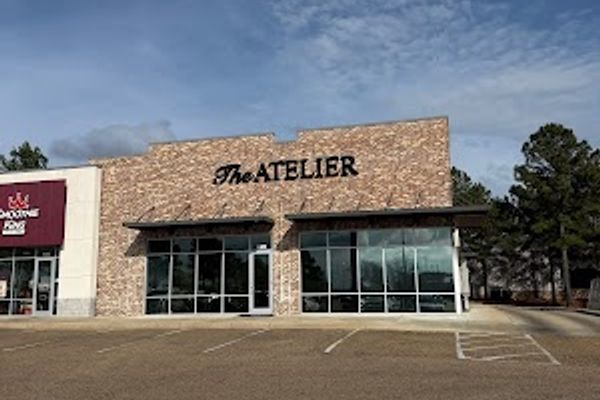 Clean, professional medical spa treatment room with neutral tones at The Atelier in Jackson