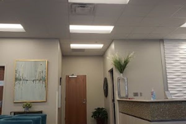 Clean, professional medical spa treatment room with neutral tones at The Face & Body Center of Plastic and Hand Surgery Associates in Jackson