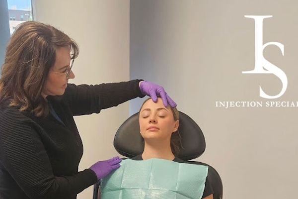 Clean, professional medical spa treatment room with neutral tones at The Injection Specialist @ Gleam Medical Spa in Cherry Creek