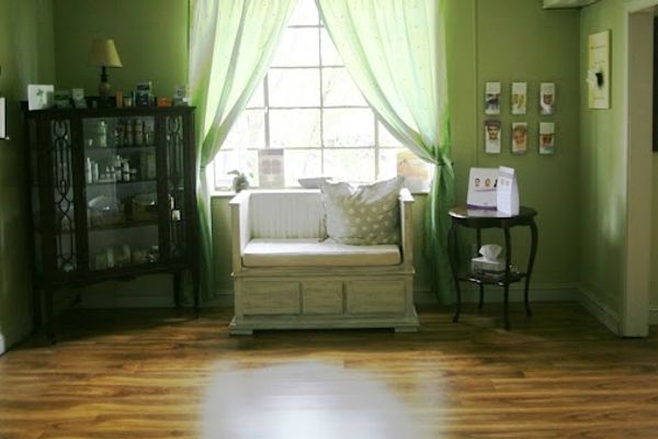 Clean, professional medical spa treatment room with neutral tones at The Lotus Spa of Aesthetics in Raleigh