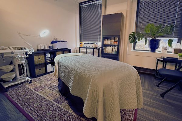 Clean, professional medical spa treatment room with neutral tones at Urbaine Oasis Spa Boutique in Milwaukee