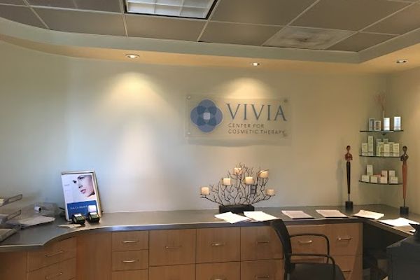 Clean, professional medical spa treatment room with neutral tones at Vivia Center MedSpa in Tysons